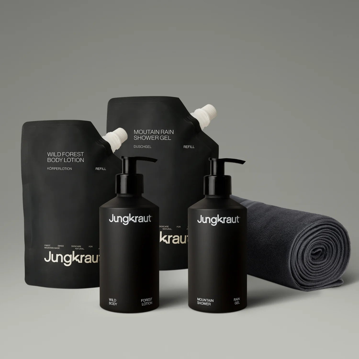 Essential Body Care Set with Swiss NatureTECH formula, refillable aluminum bottles, and free microfiber cloth